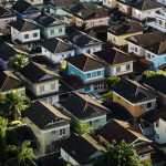Aerial view of colorful suburban houses.