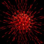 Red virus illustration with radiating spikes.