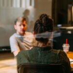 Two people in a business meeting.